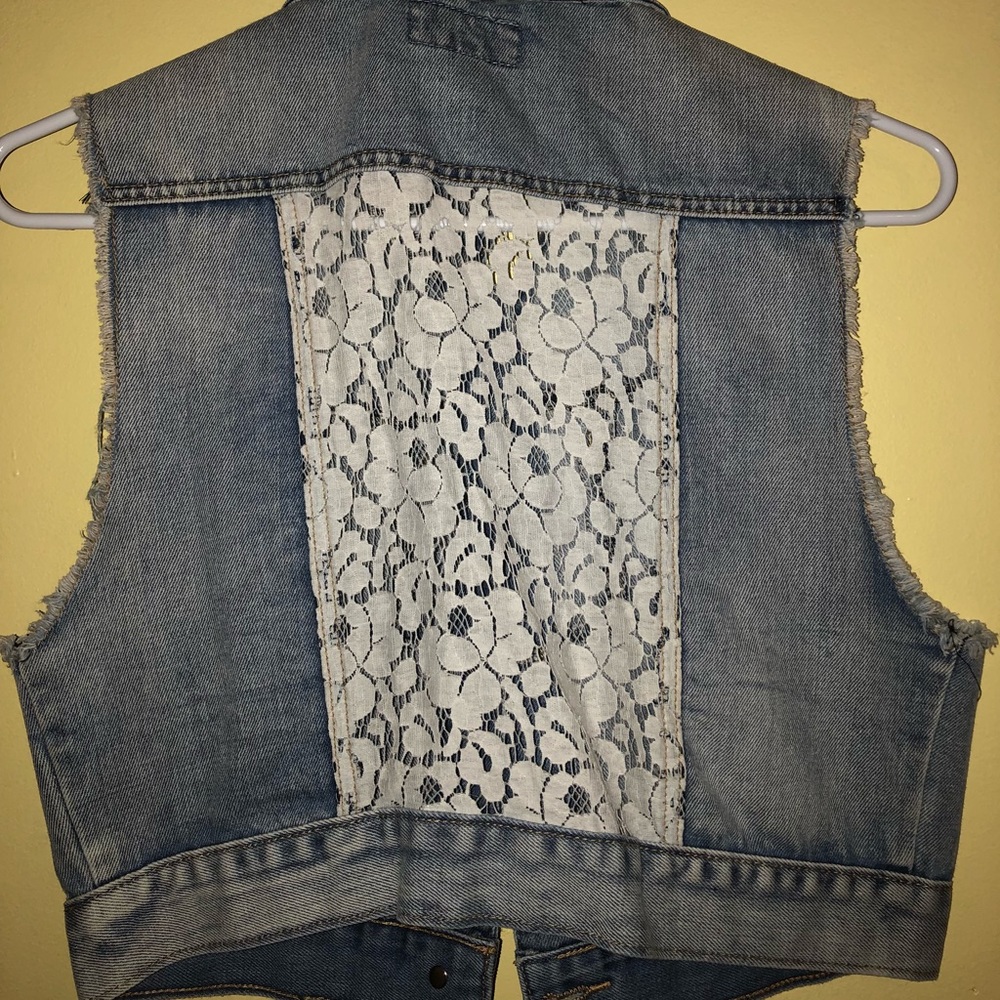 Large denim vest with white lace in back